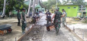 Satgas TMMD Kodim 0317/TBK Semenisasi Jalan Menuju Masjid