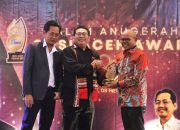 Dinilai Sebagai Penggerak Pembangunan, Pj Bupati Aceh Utara Terima Award dari SMSI